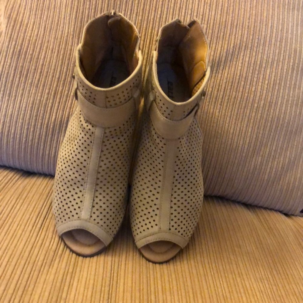 Earth cut out ankle boots.